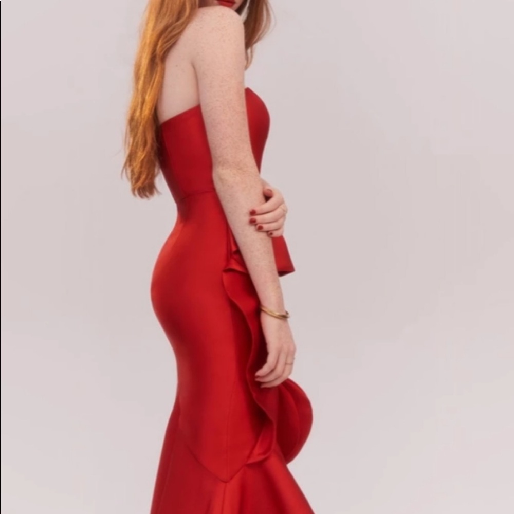 Red carpet ready in this red, mermaid maxi gown!